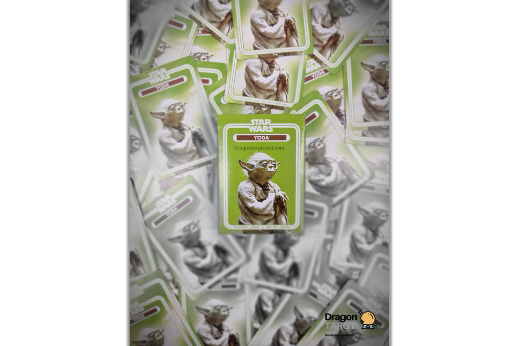 A Star Wars Yoda collectible card is centered over a scattered pile of matching cards, with a Dragonfly logo watermark in the bottom right corner.