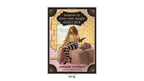 Front cover of the 'Believe in Your Own Magic Oracle Deck' by Amanda Lovelace, featuring an illustration of a witch sitting on a table with a cauldron and wand in a brick courtyard. The Dragonfly Games logo is visible at the bottom.