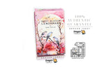 Dragon Tarot Sweet Blossom Lenormand card deck box with pink floral artwork and bird illustrations, shown on a white background with promotional text and Dragon Tarot logos.