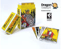 Dragon Tarot deck of cards with its yellow box, two loose cards, and several fanned cards on a white background. The box and cards feature colorful tarot illustrations, and the Dragon Tarot logo is visible in the upper right.