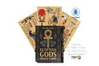 Dragon Tarot Egyptian Gods Oracle Cards deck box in black with gold Ankh symbol, shown with three illustrated cards fanned behind it on a white background. Visible branding includes Silvana Alasia and Dragon Tarot.