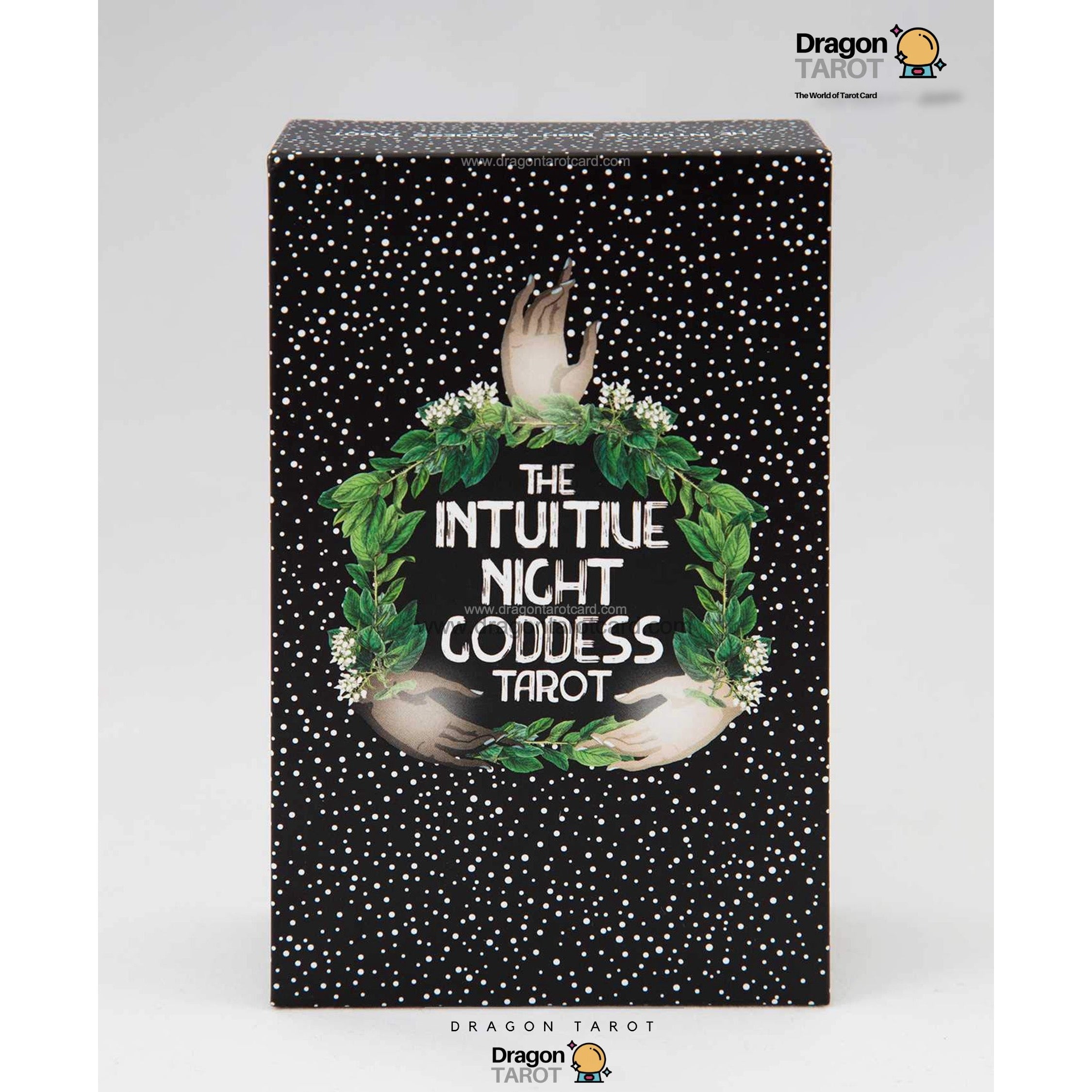 The Intuitive Night Goddess Tarot deck box by Dragon Tarot, featuring a black background with white stars, green foliage, and white hands holding a central emblem.