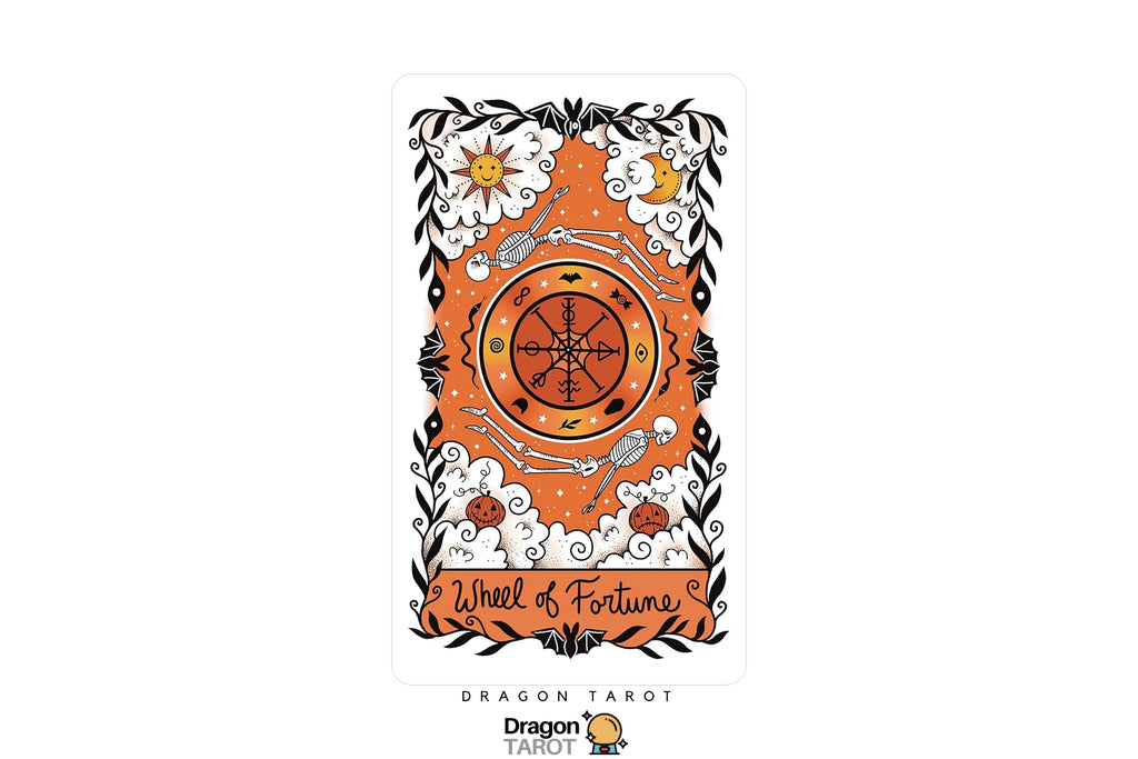 A tarot card design reading 'Wheel of Fortune' with an orange central wheel, black ornamental border, white clouds, and small decorative motifs. The card is centered on a light gray background, with a small 'Dragon Tarot' logo below.