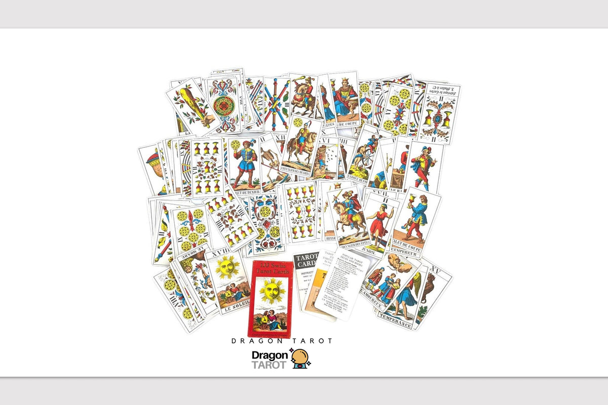 A spread of Dragon Tarot deck cards arranged on a white background, with the red and gold Dragon Tarot box at the bottom center and the Dragon Tarot logo printed below the cards.