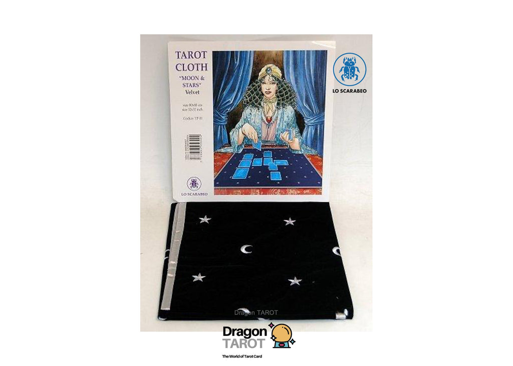 A tarot cloth set shown with its retail box. The cloth is black with a white celestial pattern of stars and crescent moons, displayed in front of its white packaging box which features an illustration of a tarot card scene.