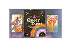 Queer Tarot deck and guidebook set featuring a central black box with a rainbow and the title 'Queer Tarot' flanked by two illustrated tarot cards on a purple glittery background.