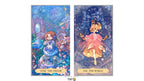 Two vertical illustrated tarot-style cards shown side by side on a white background. The left card reads 'XXIII - THE DREAM' and depicts a blue-haired girl in a blue dress in a whimsical fantasy scene.