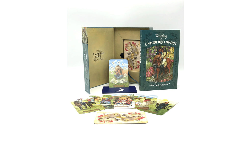 Tarot deck set with a green illustrated box, a deck of cards, a book titled 'Reading the Unbridled Spirit', and several scattered tarot cards on a white background.