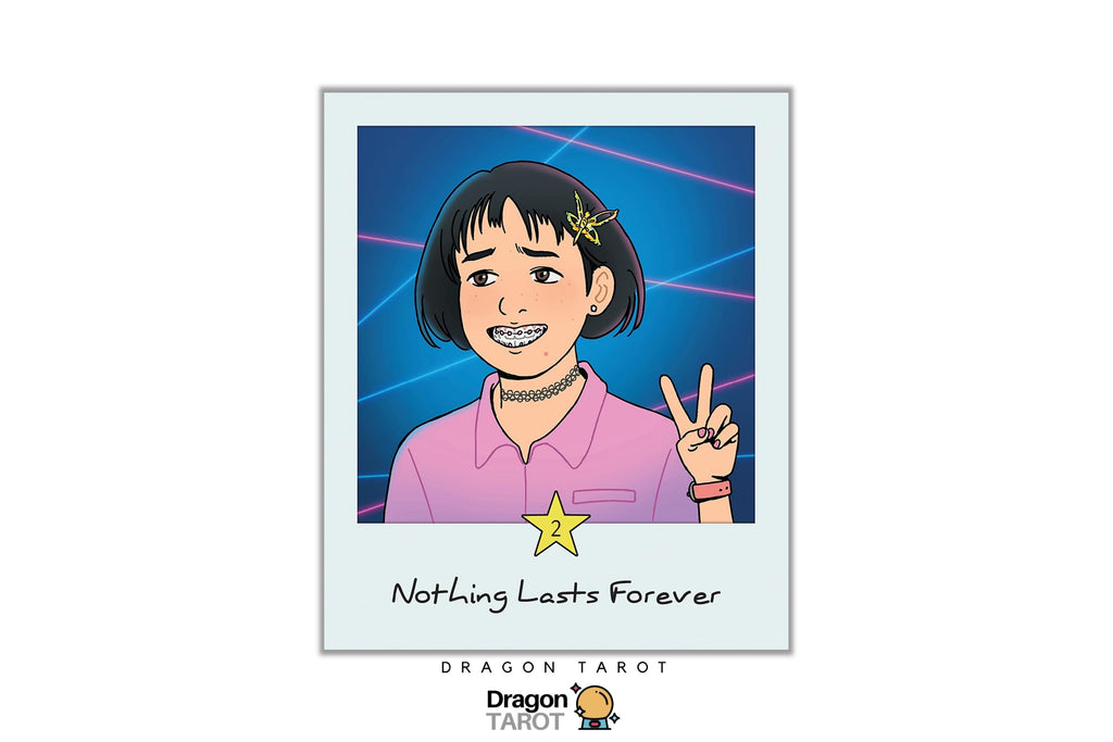 A custom illustrated polaroid-style photo print featuring a smiling woman with short black hair, a pink shirt, and a small gold star hair clip against a blue background. Below the photo, the text reads 'Nothing Lasts Forever' with the Dragon Tarot logo at the bottom.