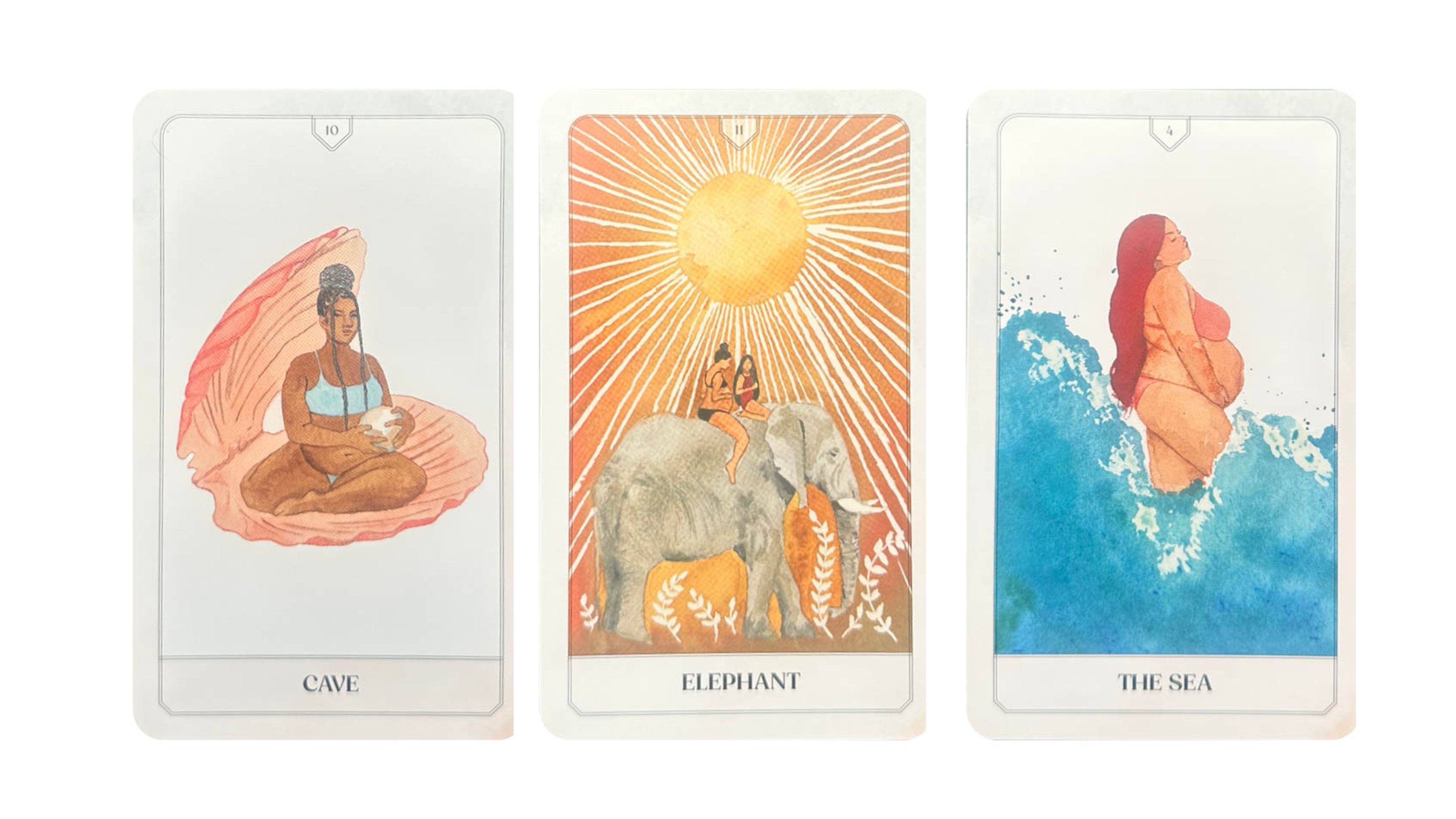 Three illustrated tarot-style cards shown side by side on a white background, labeled Cave, Elephant, and The Sea.