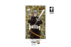 A Dragon Tarot card featuring the 'The Magician' card design, illustrated with a gray-haired figure in dark robes holding a sword and wand, set against a camouflage background. The card is shown centered on a white page with social media and publisher logos.