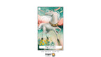 A vertical tarot card titled 'Page of Coins' featuring a white unicorn with flowing white hair and a gold collar, set against a pastel teal and pink background with small yellow flowers at the bottom. The card is centered on a white background with the 'Dragon Tarot' logo below it.