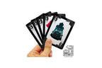 A hand holding a fan of tarot cards with a black and white design featuring a teal and red dragon illustration. The image includes Dragon TAROT branding and a small Thai icon at the top and bottom on a white background.