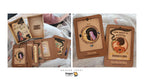 Dragon Tarot deck shown with its illustrated box, several cards fanned out, and three sample cards displayed on a soft blanket. The cards feature vintage-style brown borders and mystical illustrations with Thai text.