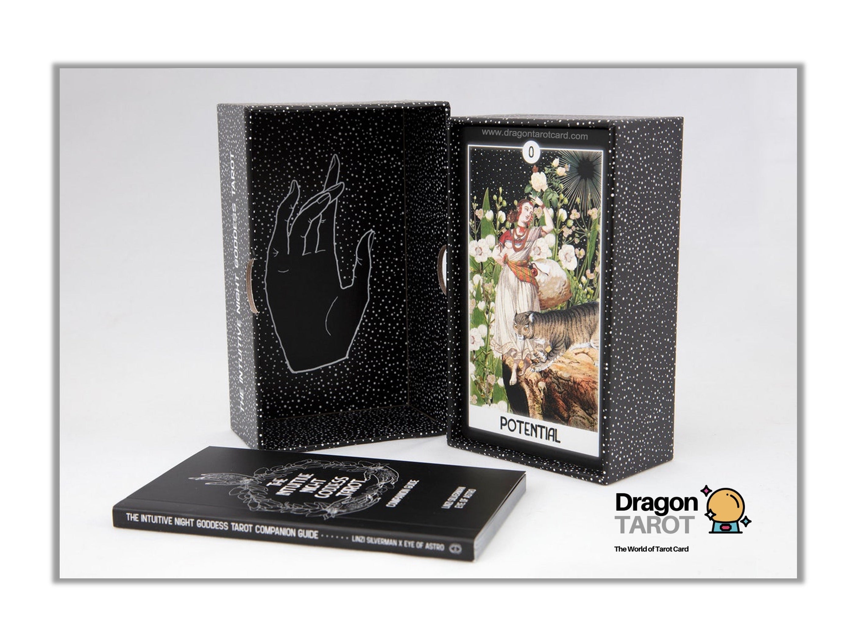 Dragon Tarot deck packaging shown on a light gray background, including a black speckled box with a hand outline, an open card display showing the Kowtari card, a flat booklet, and the Dragon Tarot logo.