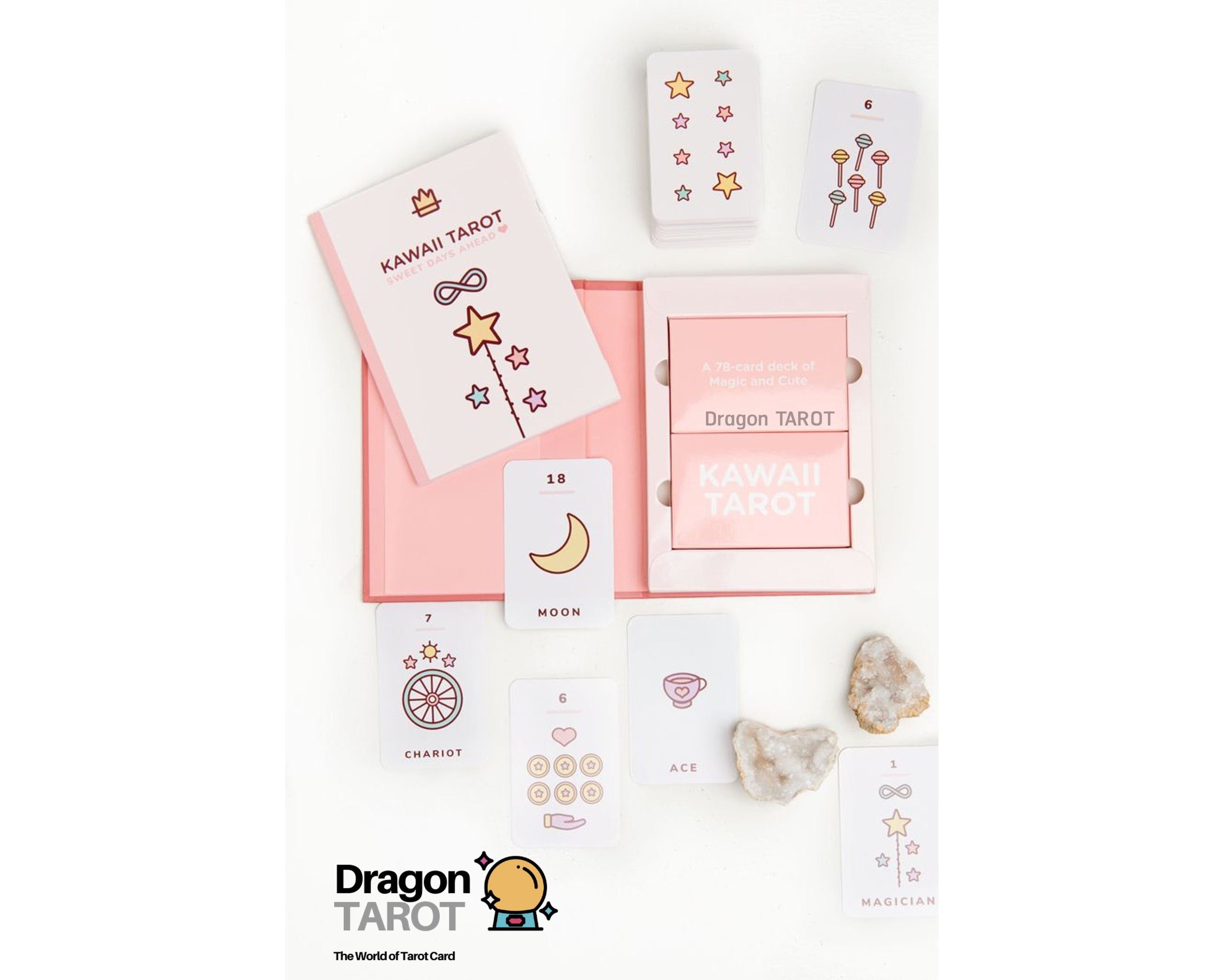 Kawah Tarot card deck set displayed on a white background, including the pink and white box, an illustrated card, a moon card, crystals, and the Dragon Tarot logo at the bottom.