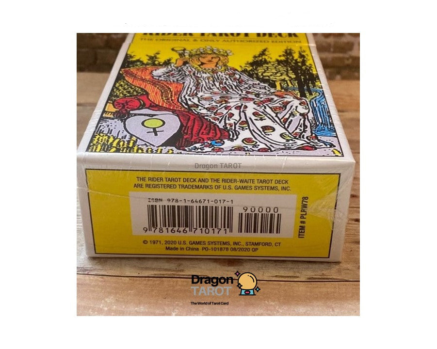 A boxed tarot card deck shown from the bottom side, with a yellow label and a colorful illustrated top panel featuring a white horse and rider. The product appears to be the Tarot Deck by U.