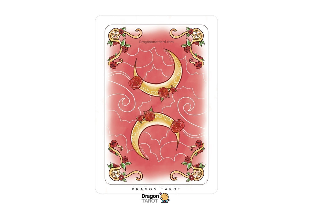 A single Dragon Tarot card centered on a white background, showing a pink card back with two gold crescent moons, red roses, and ornate gold corner flourishes. The Dragon Tarot logo appears at the bottom.