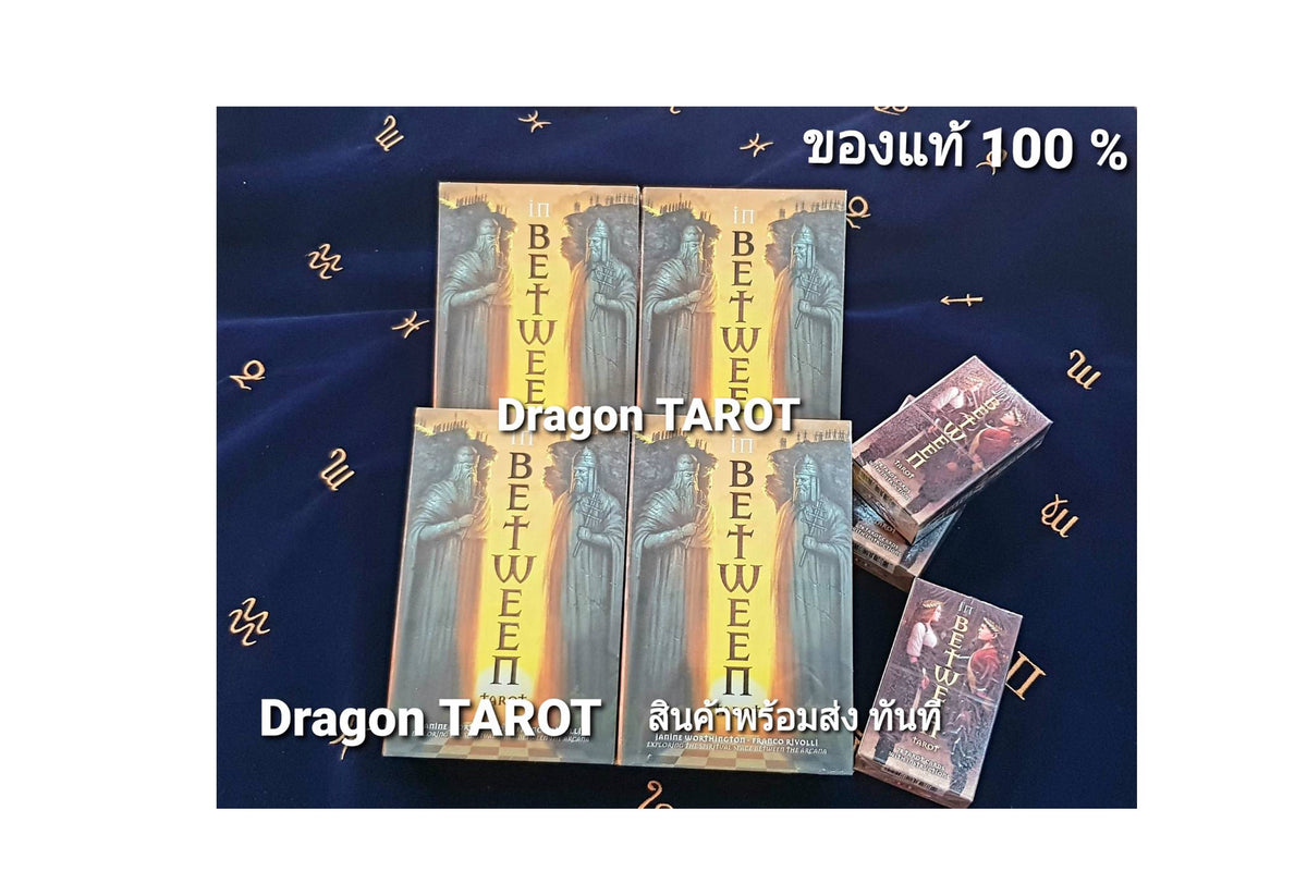 Four boxed tarot cards labeled 'Dragon TAROT' and 'BETWEEN' are arranged on a dark blue fabric background with gold symbols. Thai text is visible at the top and bottom, and there is a white border around the image.
