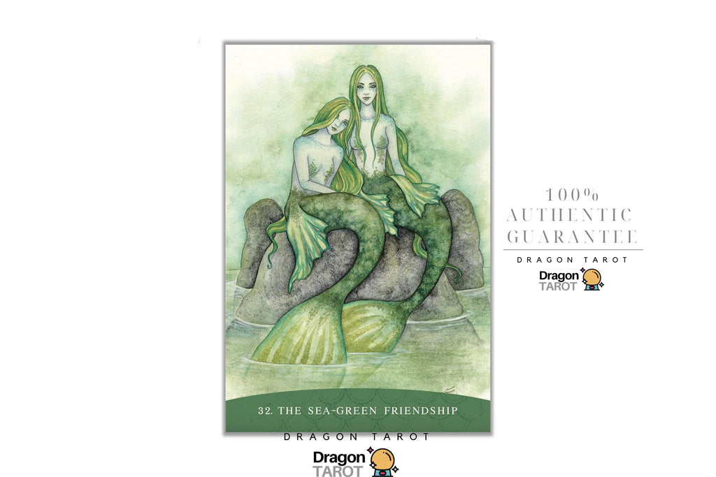 Dragon Tarot card titled '32. The Sea-Green Friendship' featuring an illustration of two mermaids with green tails and hair, set against a light green background.