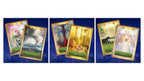 Three sets of illustrated oracle or tarot-style cards displayed side by side against a dark blue starry background. Each set shows two overlapping cards with gold borders and fantasy artwork: a pink angel card, a stormy blue card, a forest tree card, a glowing forest fire card, a green landscape card, and a white angel card.