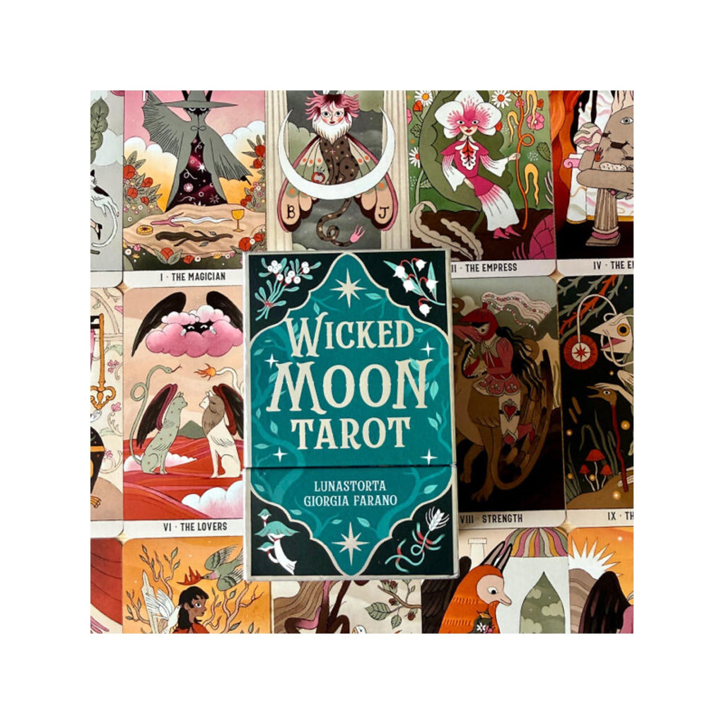 Wicked Moon Tarot deck box shown against a collage of illustrated tarot card backs. The central box is teal with white lettering and decorative stars, surrounded by colorful card art in pink, gold, brown, and cream tones.