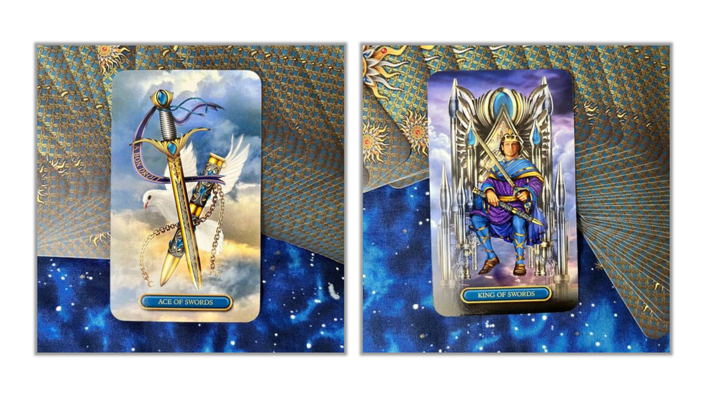 Two illustrated tarot-style cards shown side by side on a decorative blue and gold background. The left card depicts a winged sword with the text 'Ace of Swords,' and the right card depicts a throne figure with the text 'King of Swords.
