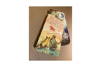 A boxed card deck titled 'King of Little Princess' with illustrated cover art showing a turtle, fox, and a red carriage, photographed on a tan textured surface.