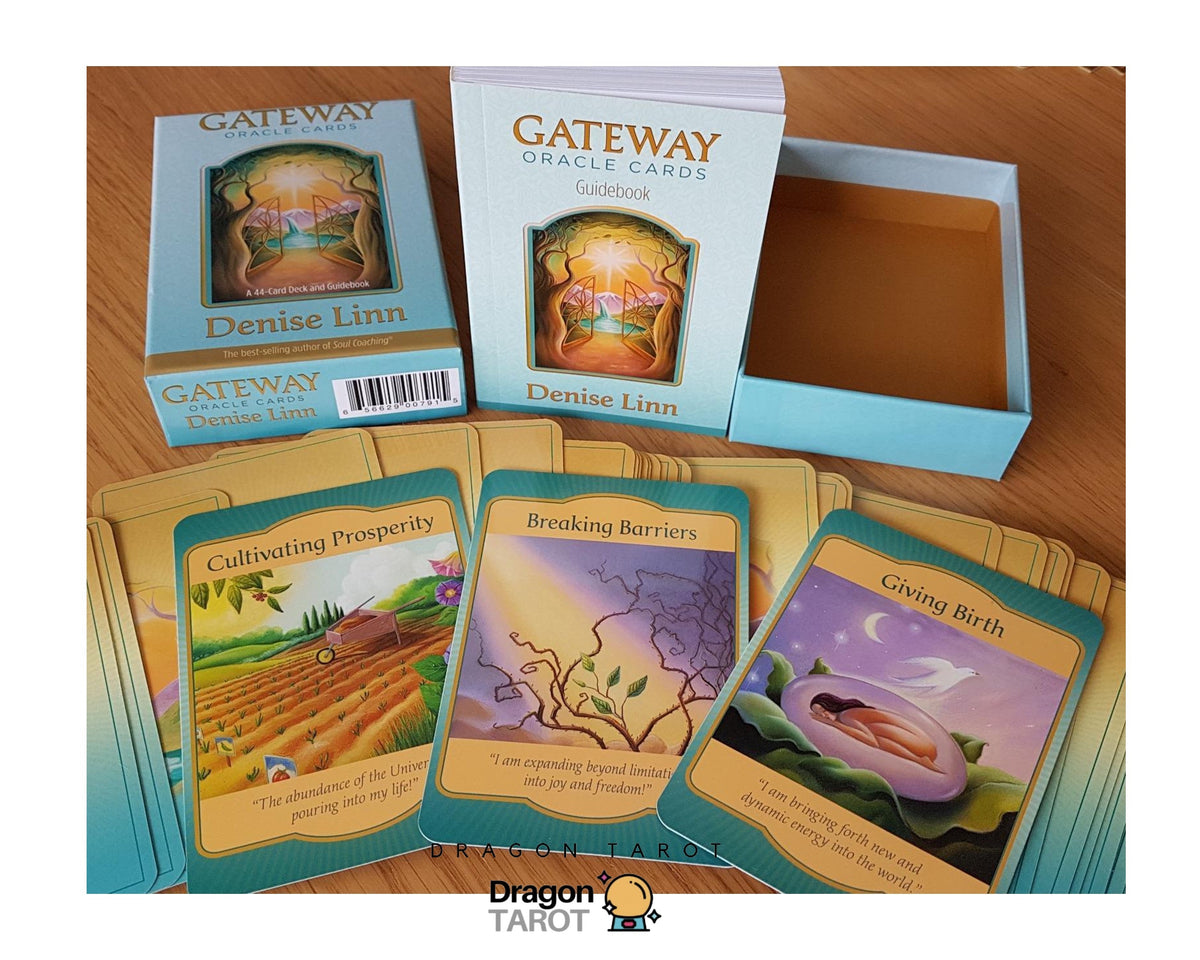Gateway Small Tarot Cards deck by Denise Linn, showing the light blue box, inner box, and several illustrated cards spread out on a wooden surface.