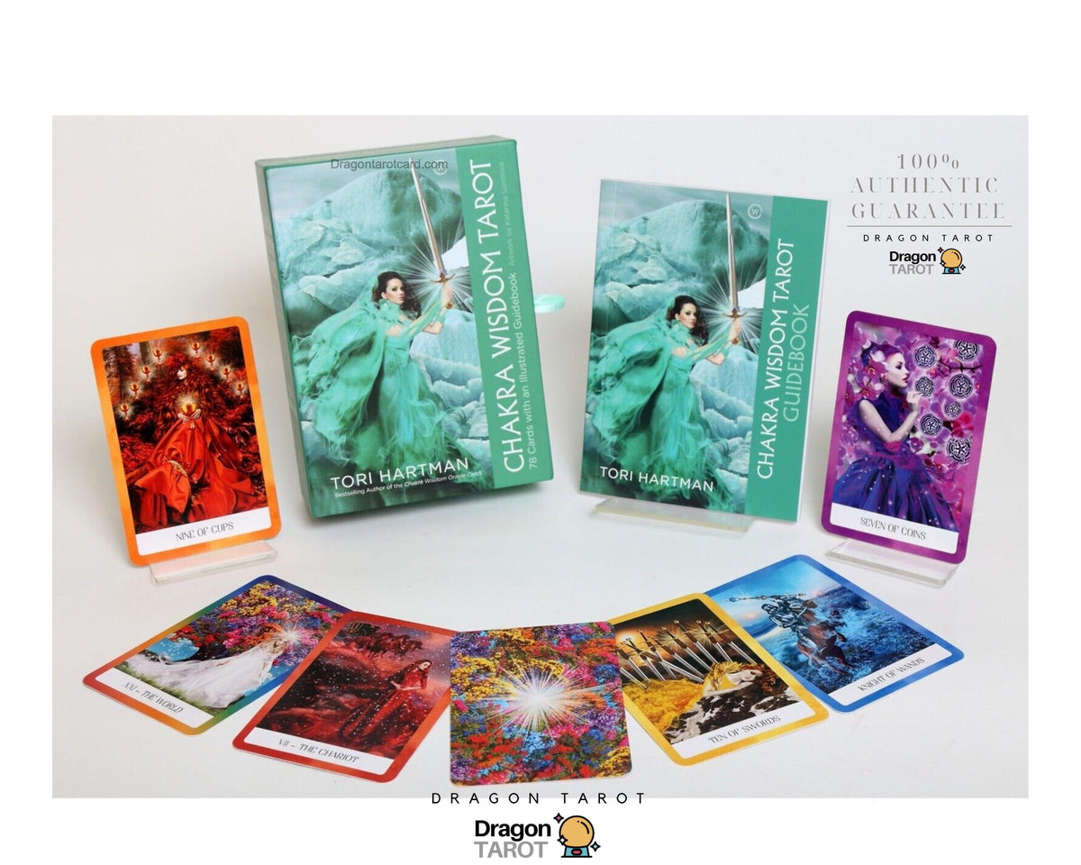 Dragon Tarot Chakra Wisdom Tarot deck displayed with its green outer box, inner box, two illustrated cards, and several cards fanned out on a white background.
