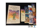 A boxed tarot card deck titled 'Viceversa Tarot' shown with several illustrated cards fanned out beside it on a black background. The box cover features a fantasy-style figure in green robes, and the cards display colorful artwork with figures and scenes.