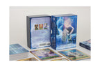 Energy Oracle Cards deck shown with its blue illustrated box, back cover, and several cards spread out on a light neutral surface.
