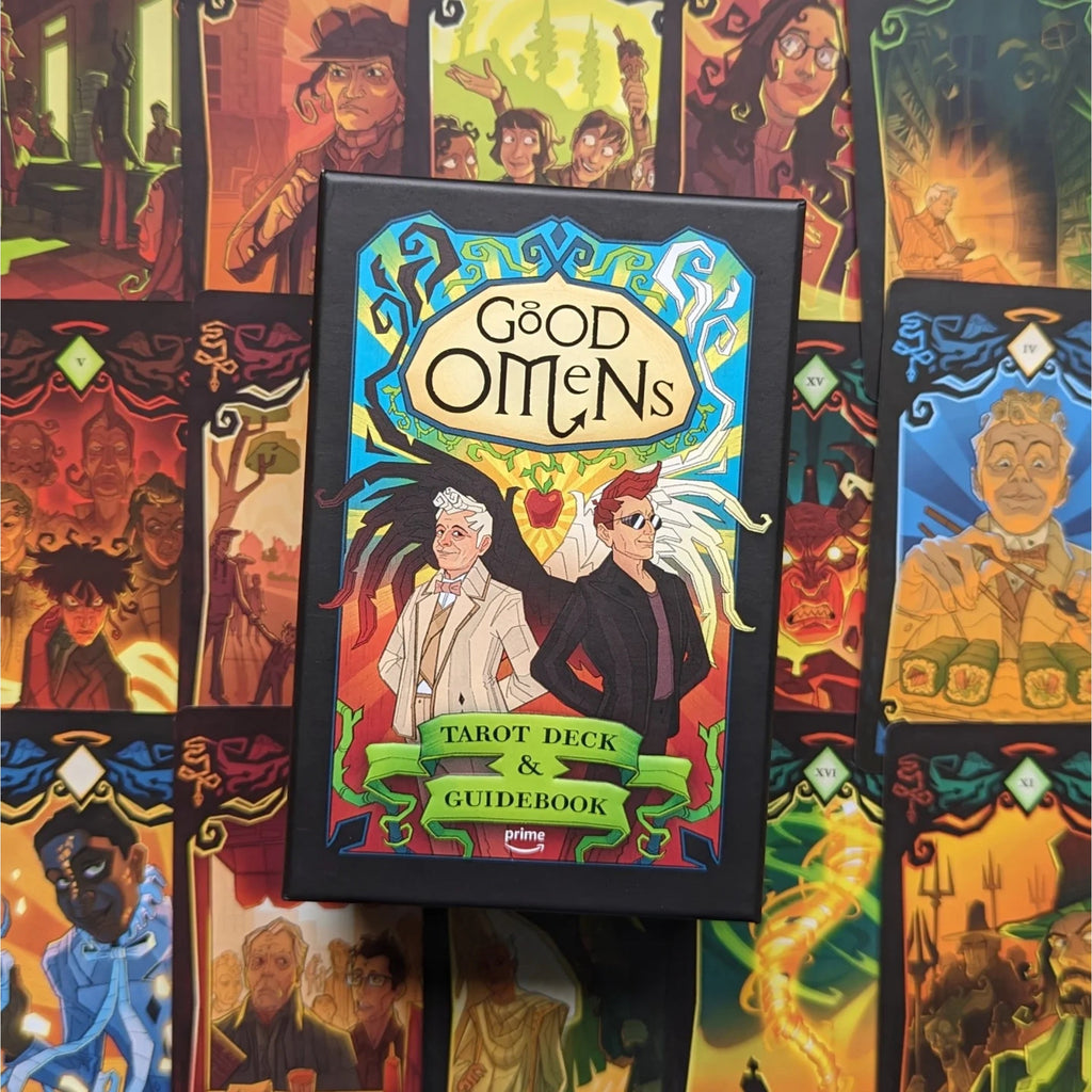 Good Omens Tarot Deck and Guidebook box centered against a background of colorful illustrated tarot cards.