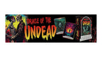 Oracle of the Undead card deck packaging and cards shown on a black background with horror-themed artwork featuring two skeletal figures and large dripping red and yellow title text.